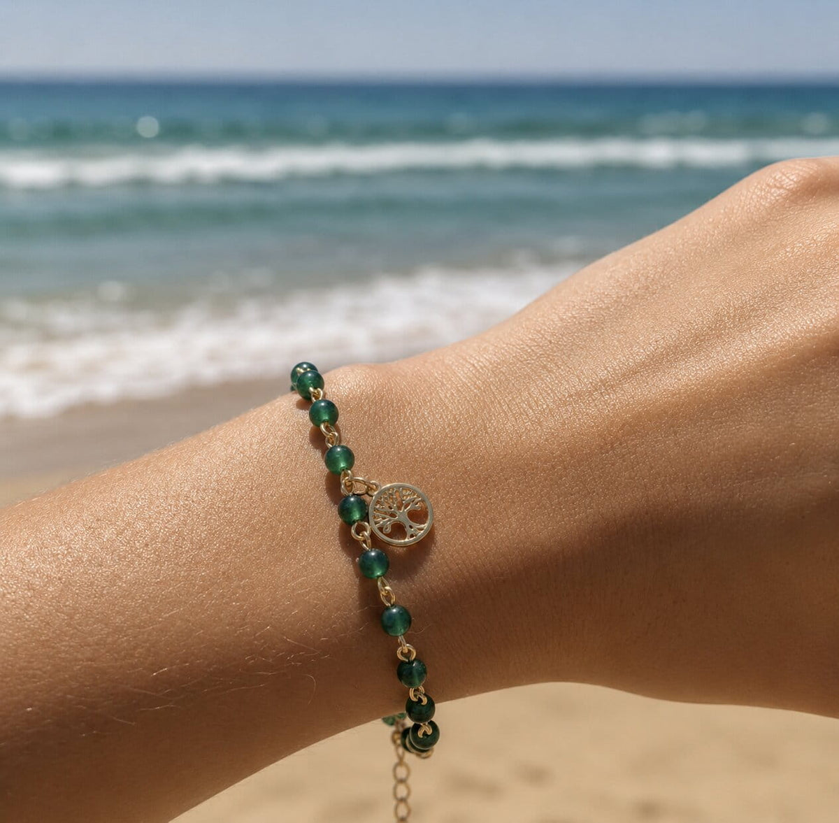Vouves Bracelet on a wrist by the sea.